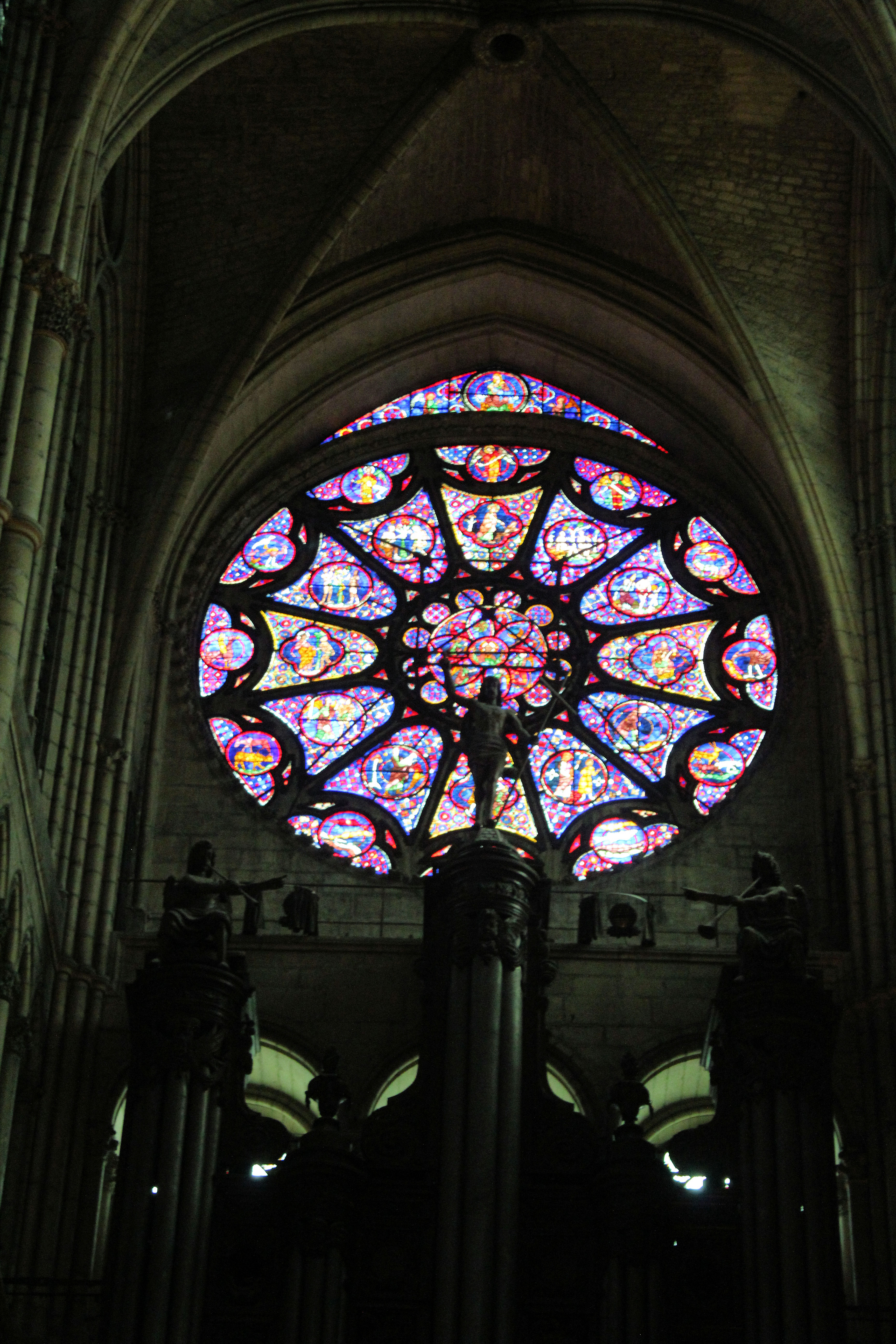 Rose Stained Glass Windows in Notre Dame Cathedral