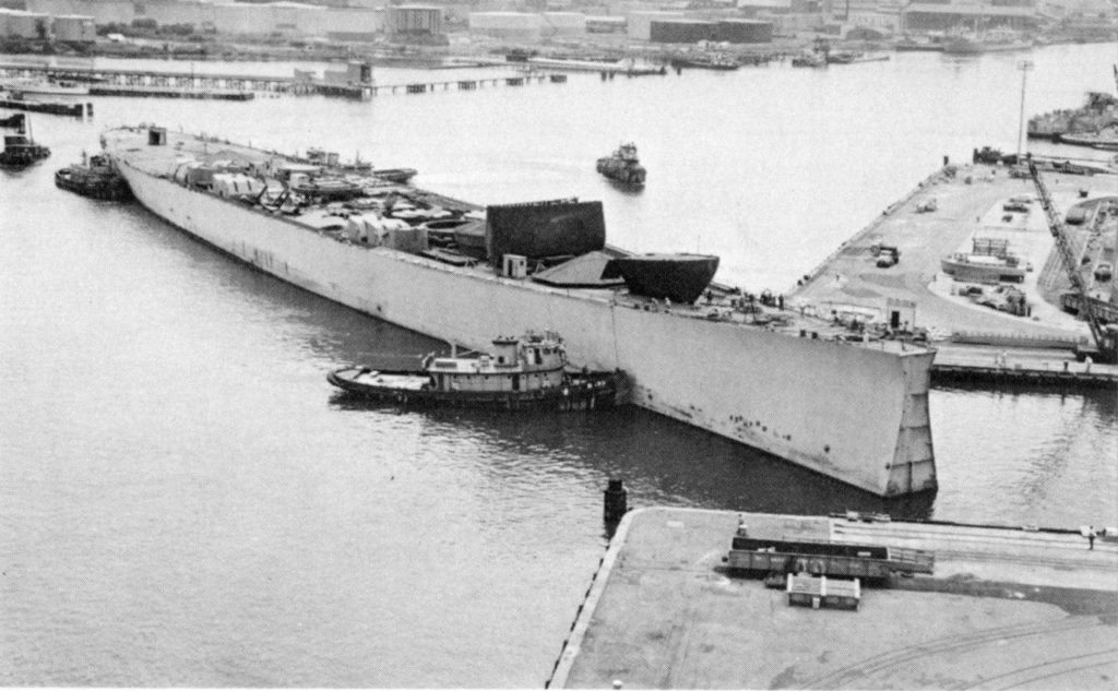 Docking here at Norfolk Navy Yard on 16 July 1958 for removal of her engines prior to scrapping