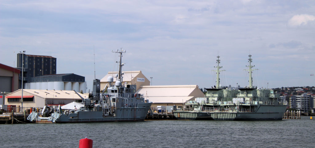 Huon-class minehunters HMAS Norman M84 (Right) with HMAS Hawkesbury M83 (Left) with Ocean Recovery Behind