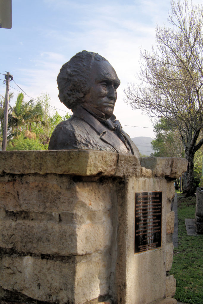 A Bust of Alexander Berry Outside Apex Park