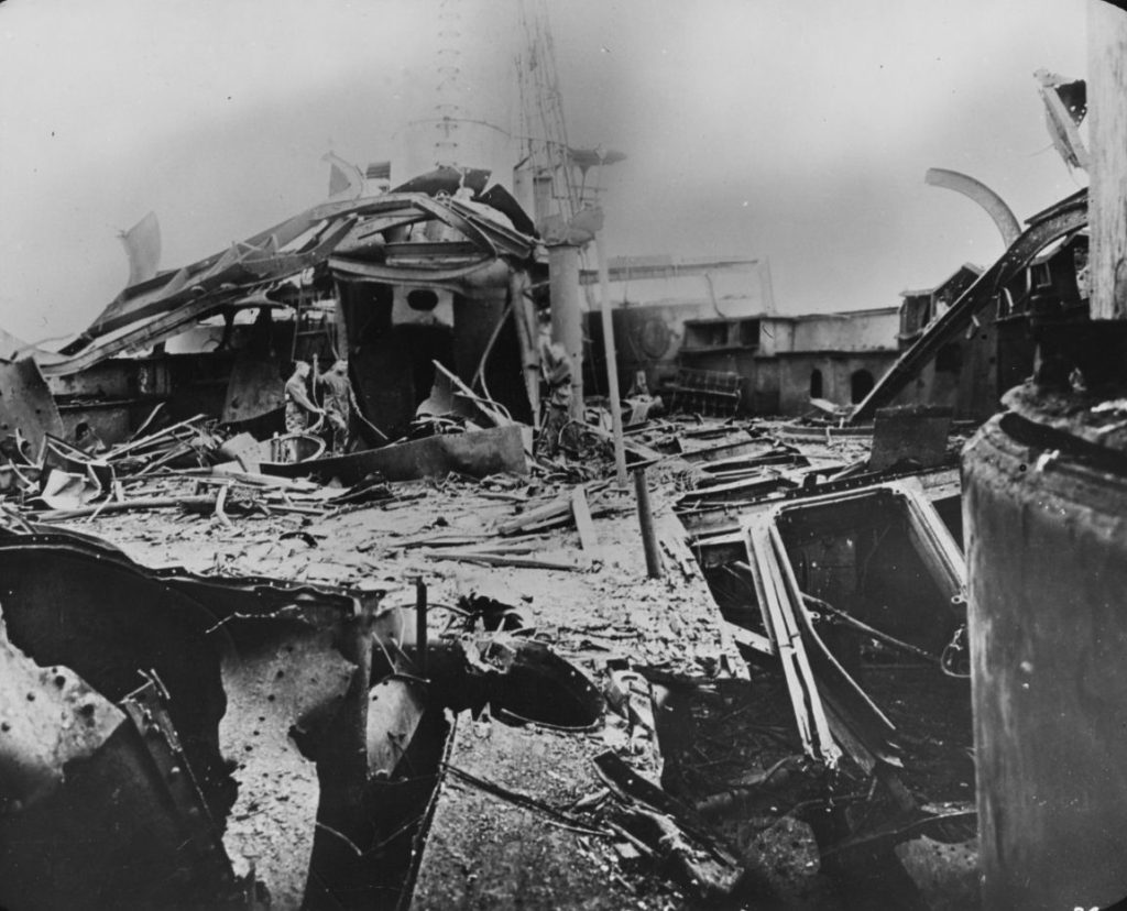 View on deck during bombing tests on her hull, circa 1920