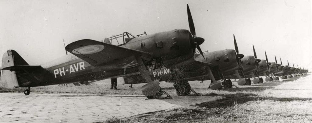 Finished fighters at Koolhoven works airfield, 1939. Airplanes bear Dutch civil markings and French military insignia