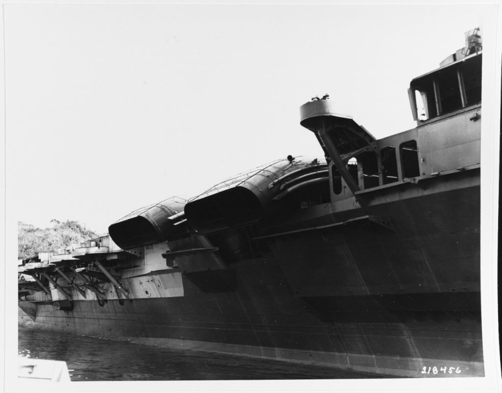 View of the Kasagi's starboard side, showing her stacks and gun sponsons. Taken at Sasebo, Japan, October 19, 1945