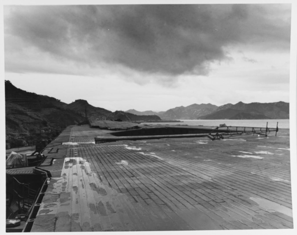 Damage to the flight deck of Ryuho at Kure, Japan, 9 October 1945. View looking aft from amidships.