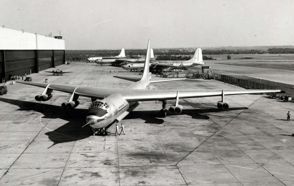 Convair YB-60 (S/N 49-2676) with three B-36s in the background.