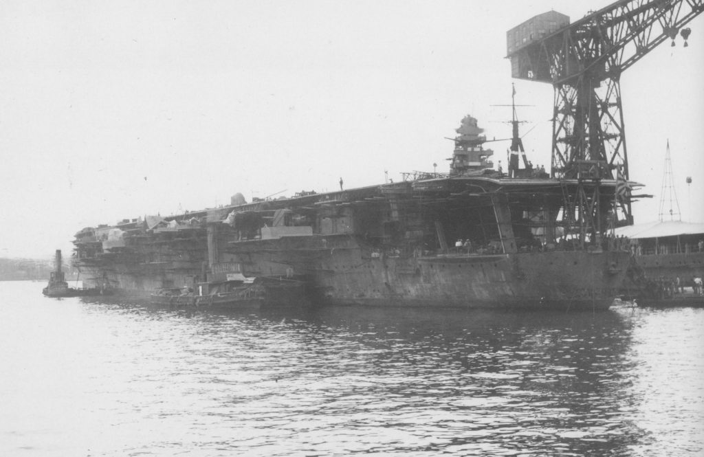 Shoho undergoing conversion to an aircraft carrier