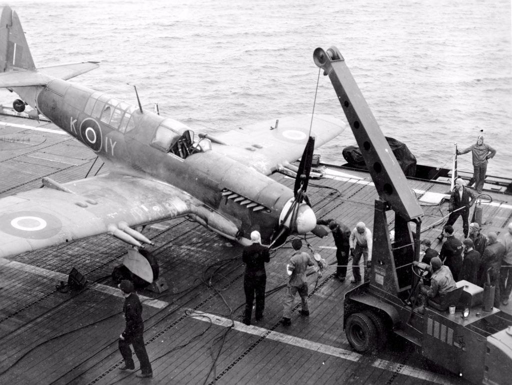 A Firefly is returned onto its wheels after flipping on its nose during a landing on HMS Puncher late in 1945