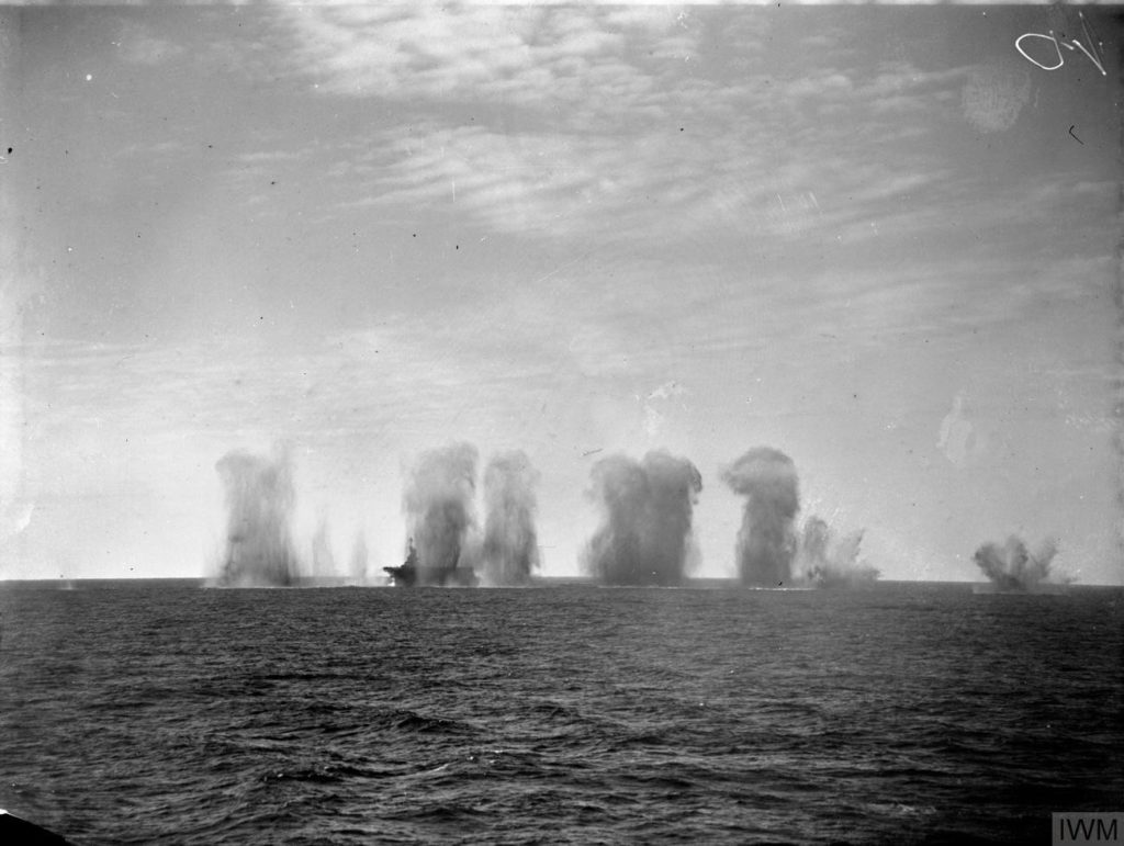 Bombs bursting round the HMS Ark Royal during an enemy air attack south of Sardinia in 1940