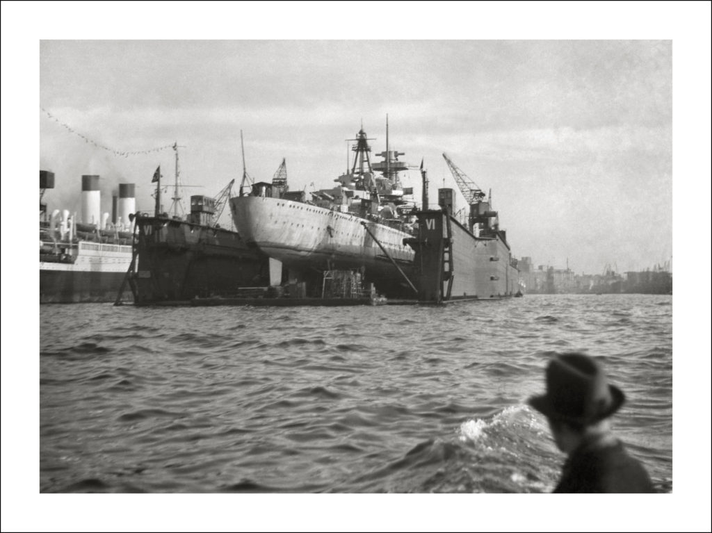 German cruiser, Admiral Hipper, fitting out at the Blohm & Voss Shipyard in Hamburg, during the late 1930's.