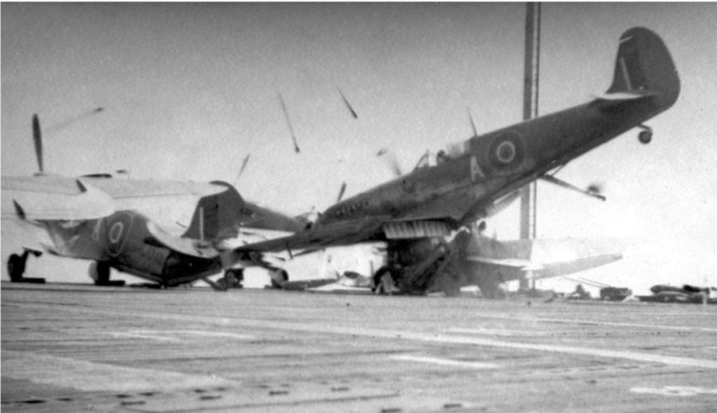 August 21 1944 Seafire LR710 floated over all the arrestor the wires and the barrier to severely damage 3 other parked aircraft