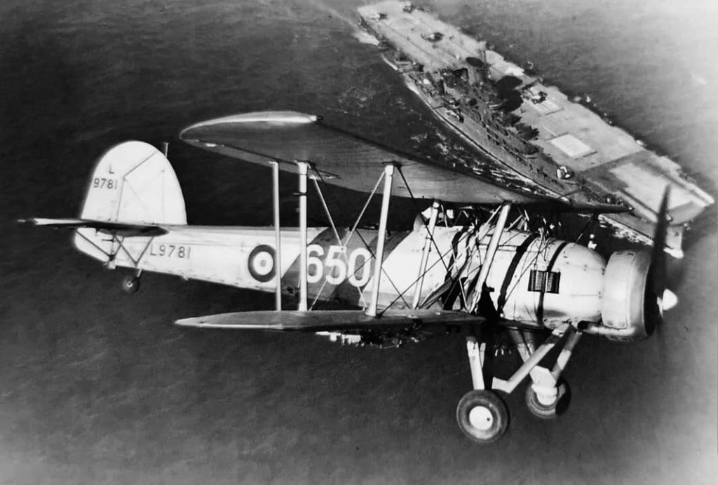 Fairy Swordfish flying over HMS Ark Royal 1939