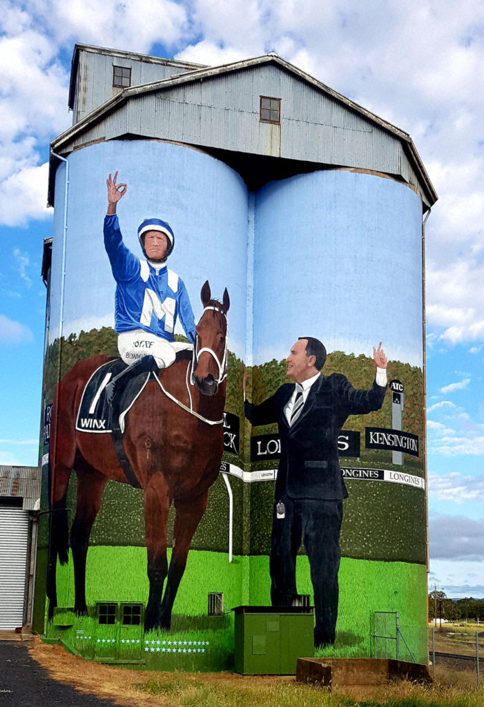 Winx and her Jockey Hugh Bowman Along with Trainer Chris Waller on the Dunedoo Silo Art