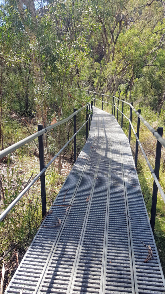 Metal Walkway into Sawn Rocks