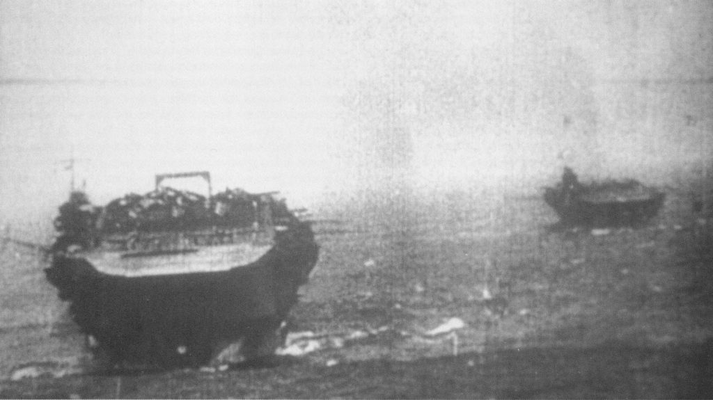 Kaga (foreground) and Zuikaku (background) head towards Hawaii through heavy seas in November or December 1941 to attack Pearl Harbor