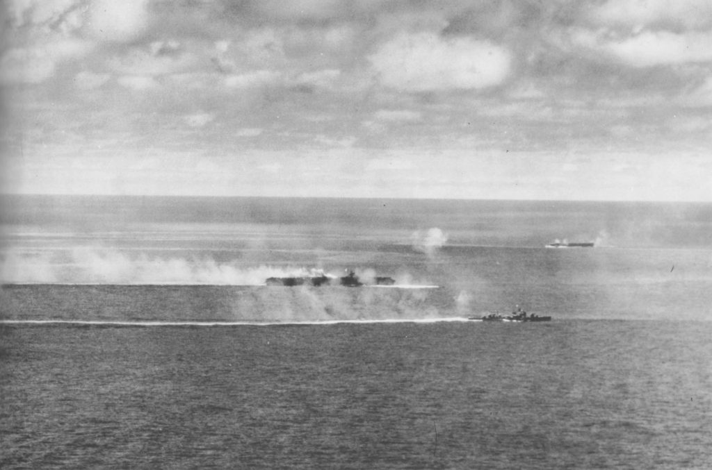 Zuikaku with destroyer Wakatsuki underway during US carrier plane attacks at about 1330 on 25 October 1944 during the Battle off Cape Engaño