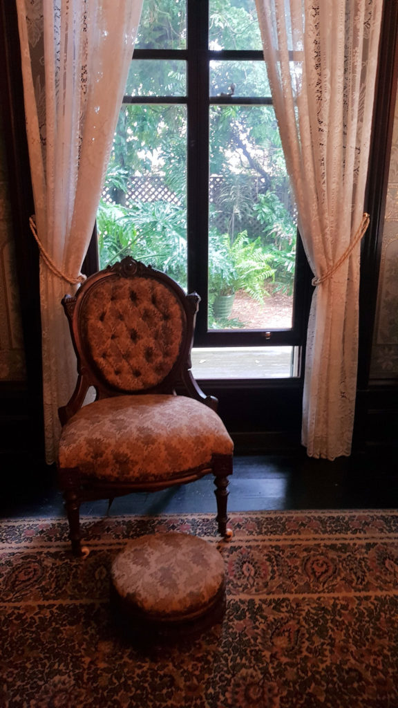 Chair With Footstool and Window View