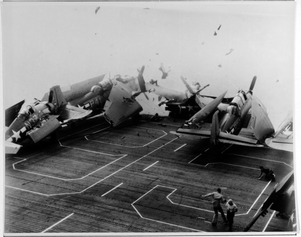 During the crash, the Wildcat is falling over the bow