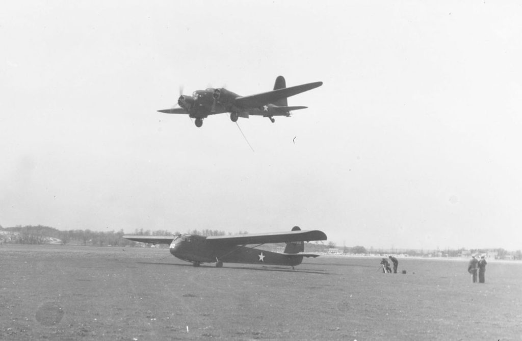 Douglas B-23 aerial pick-up test over a CG-3A