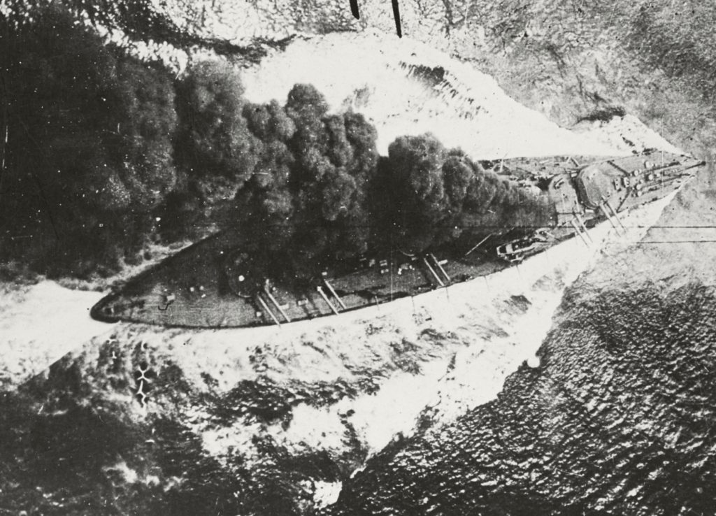 HMS Erin uses a kite balloon to evaluate her smoke-screening abilities