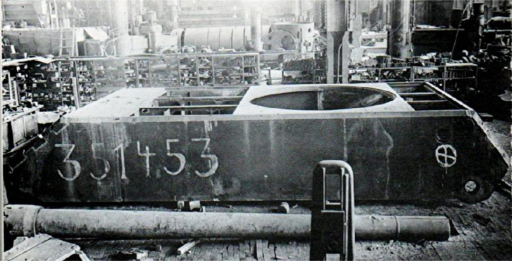 A Partially Completed Chassis and Gun on the Assembly Line