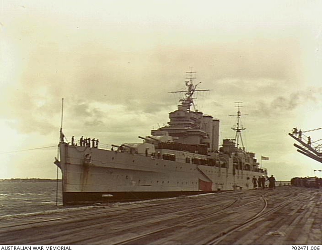 HMAS Shropshire carrying returning troops of the Australian victory contingent, berths at Prince's Pier