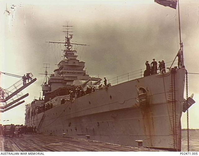 HMAS Shropshire carrying returning troops of the Australian victory contingent, berths at Prince's Pier