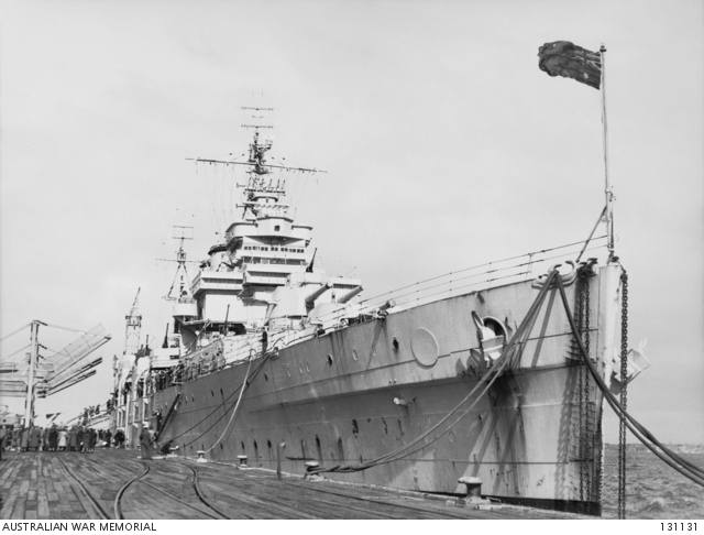 HMAS Shropshire carrying returning troops of the Australian victory contingent, berths at Prince's Pier 22 Aug 1946