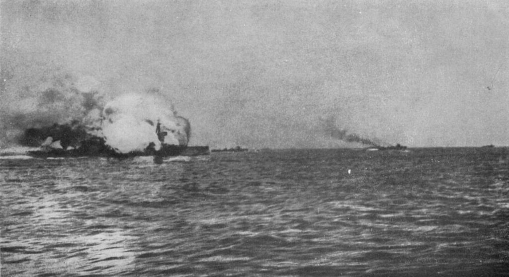 A magazine explosion destroys HMS Invincible killing 1,021 men, Battle of Jutland, 1916