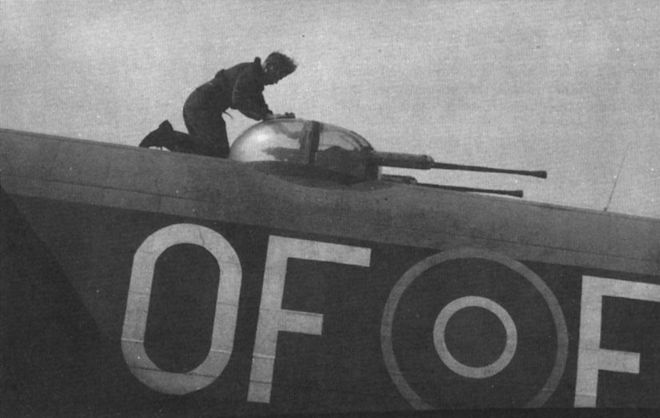 Avro Lincoln of 97 Sqn with the Rigger hard at work polishing. Note VHF aerial aft of turret. Date is May 1948, at Hemswell