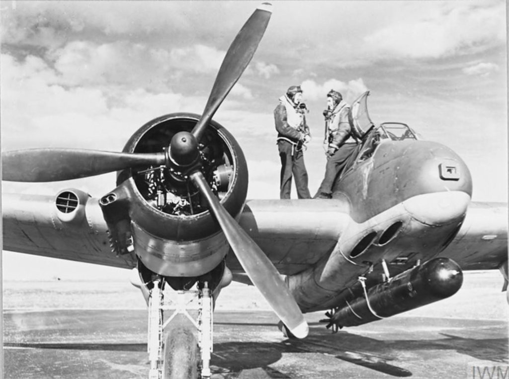 Beaufighter VIC (ITF) RAF 144Sqn crew stand by the cockpit of their aircraft