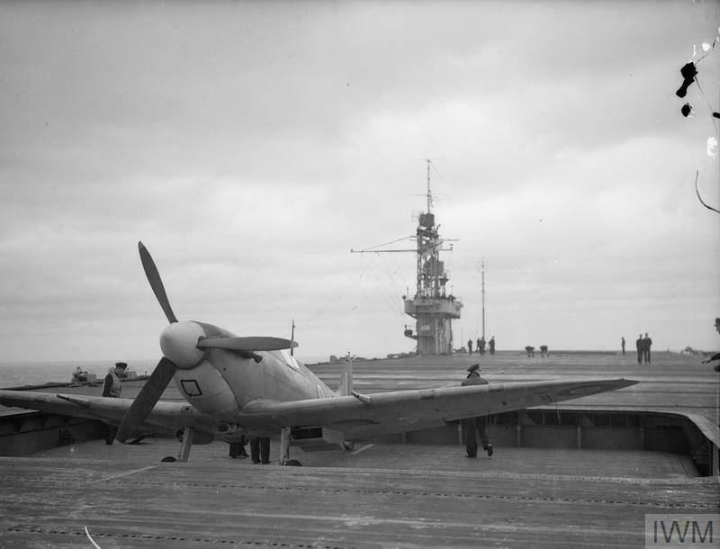 Supermarine Seafire fighter being ranged on HMS Tracker Oct 1943