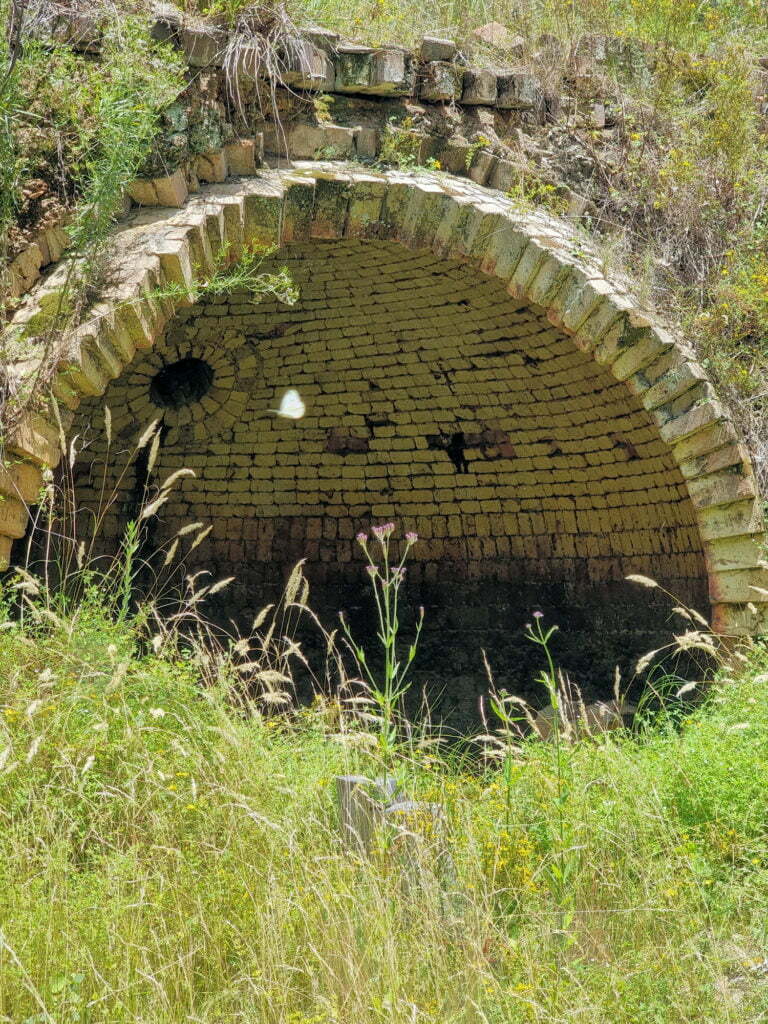 Damaged beehive kiln showing the interior