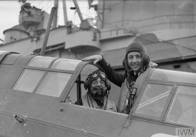 Paymaster preparing to take off in the rear cockpit of a Fairey Fulmar from HMS Victorious April 1942