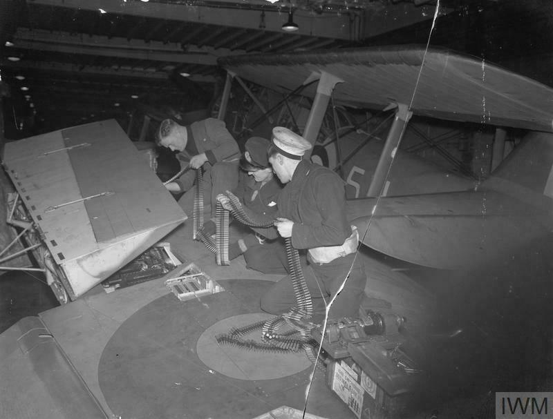 Re-arming a Fairey Fulmar February 1942 on HMS Victorious