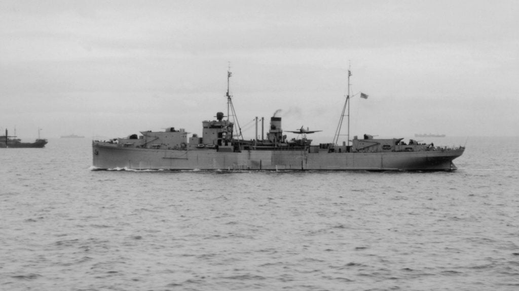 Royal Navy auxiliary anti-aircraft cruiser HMS Springbank with a Fairey Fulmar