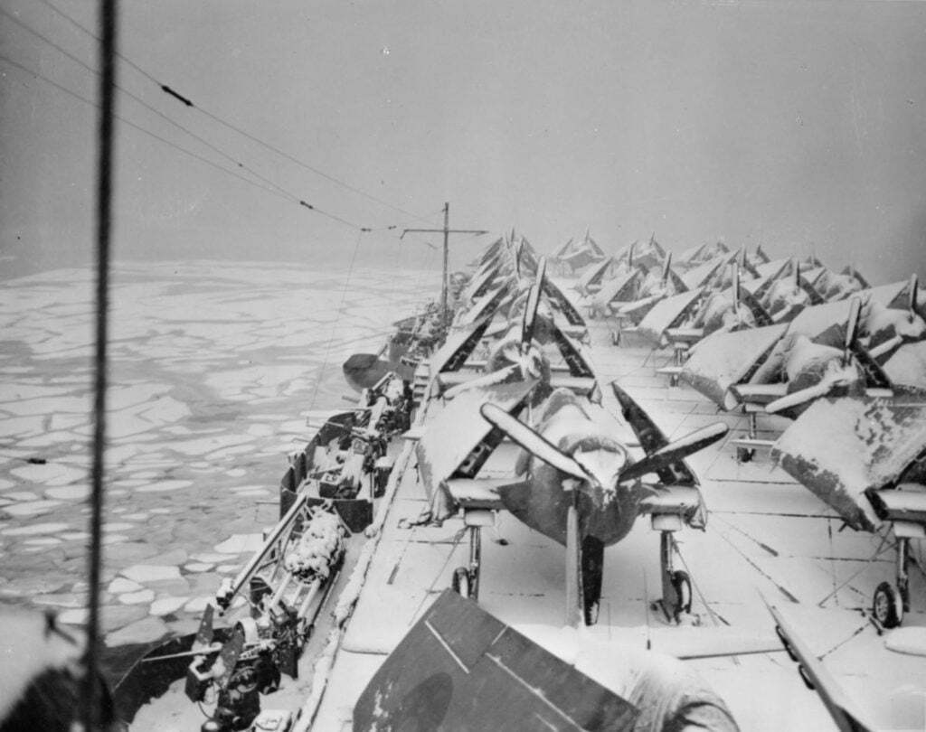 HMS Emperor off Newfoundland with her cargo of frozen Grumman Hellcats