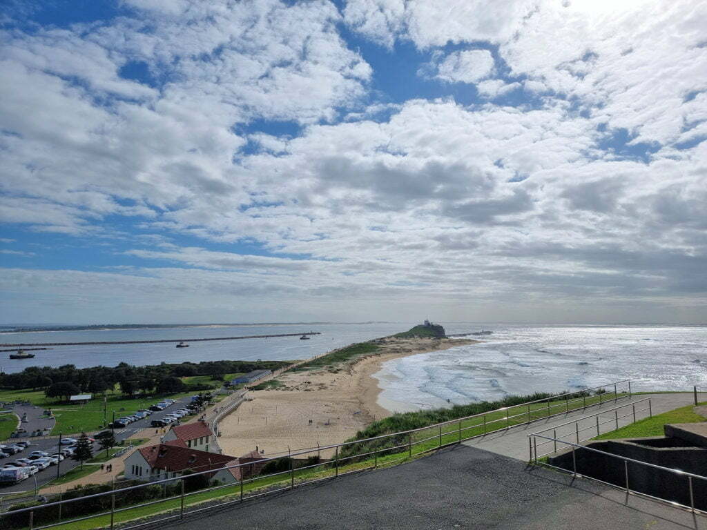 View over Nobbys Beach to the Harbour entrance