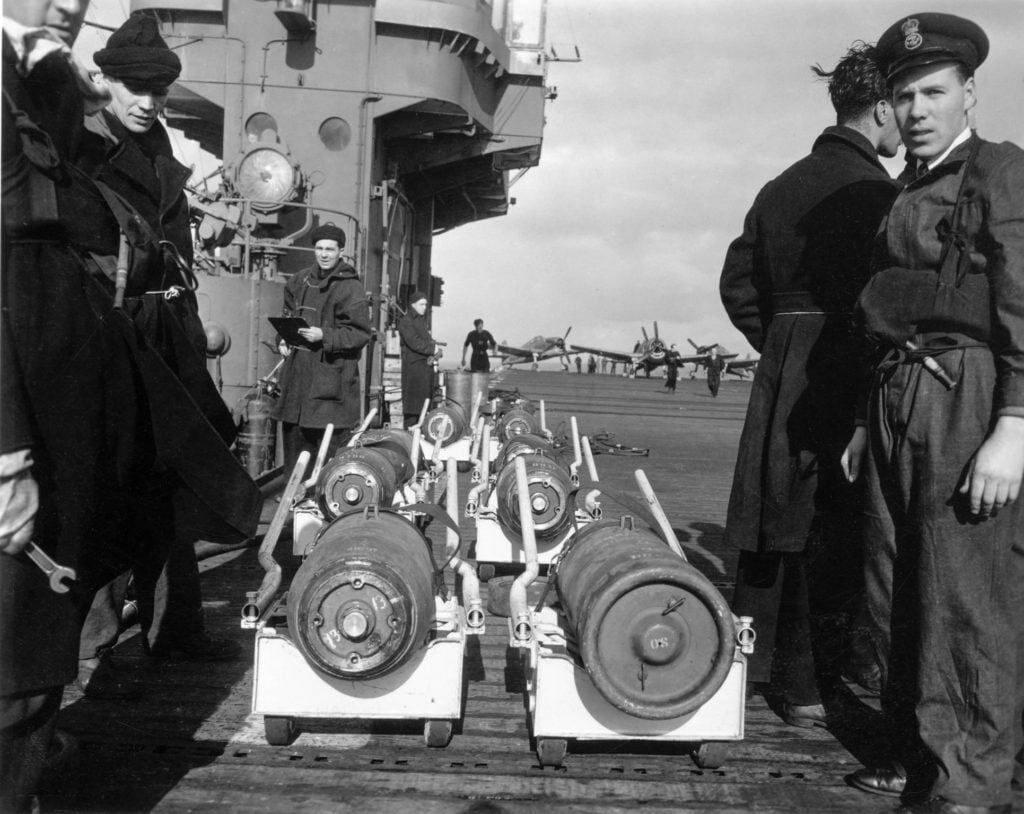 Armourers with bombs, HMS Emperor