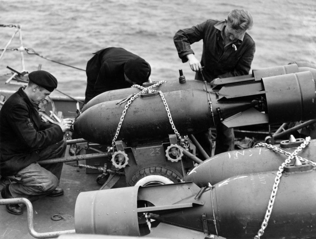 Armourers with bombs, HMS Emperor