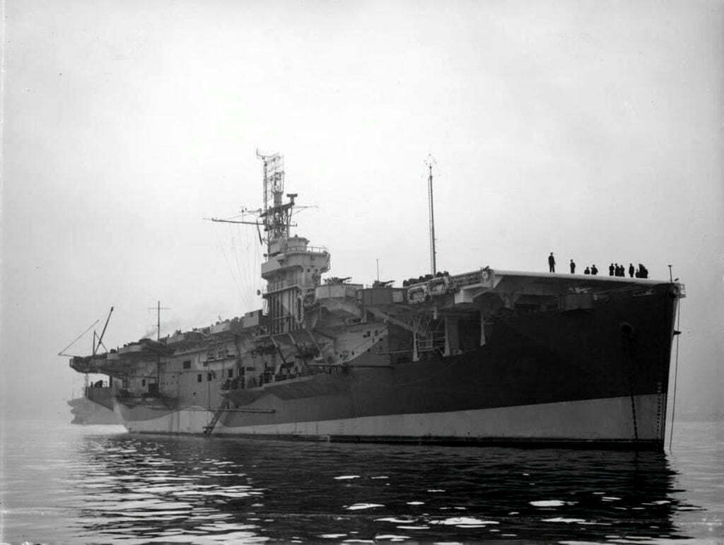 HMS Khedive (D62) anchored at Greenock, Scotland on 27 March 1944.