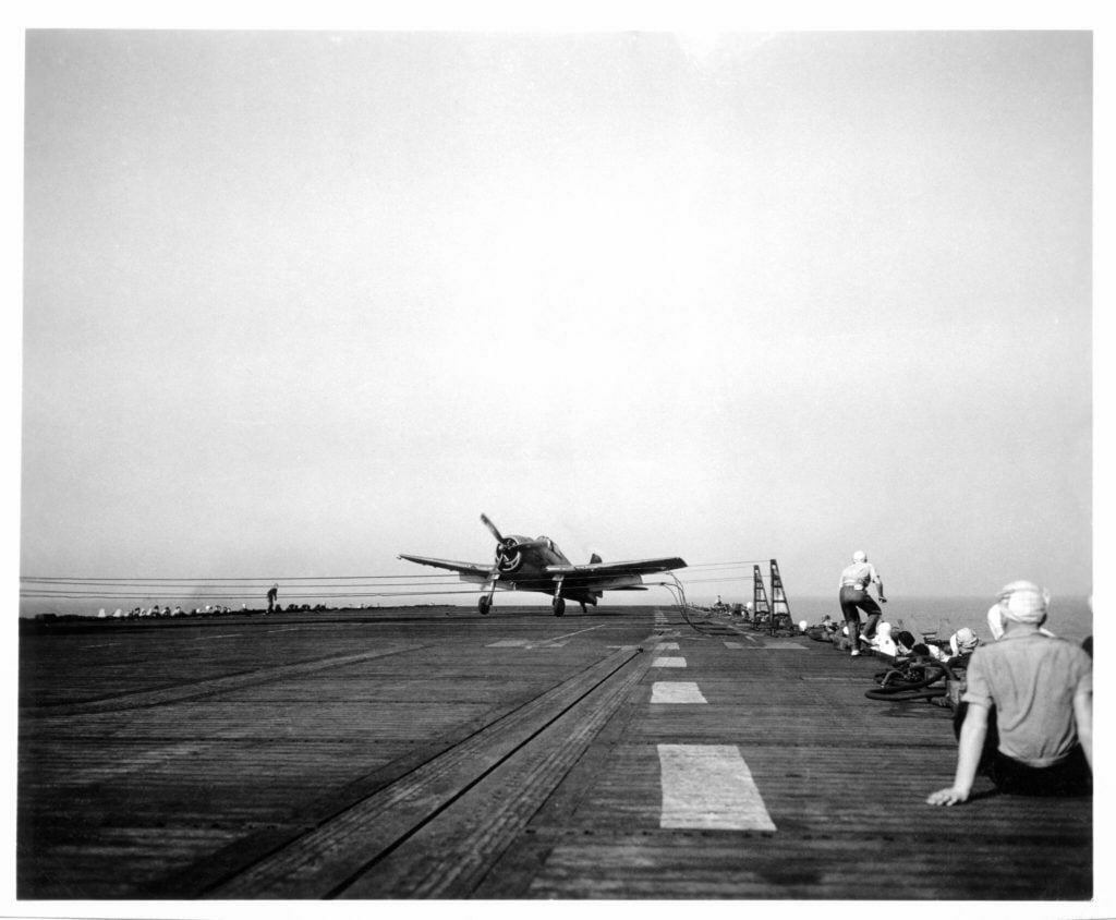 Grumman Hellcat landing on HMS Emperor.