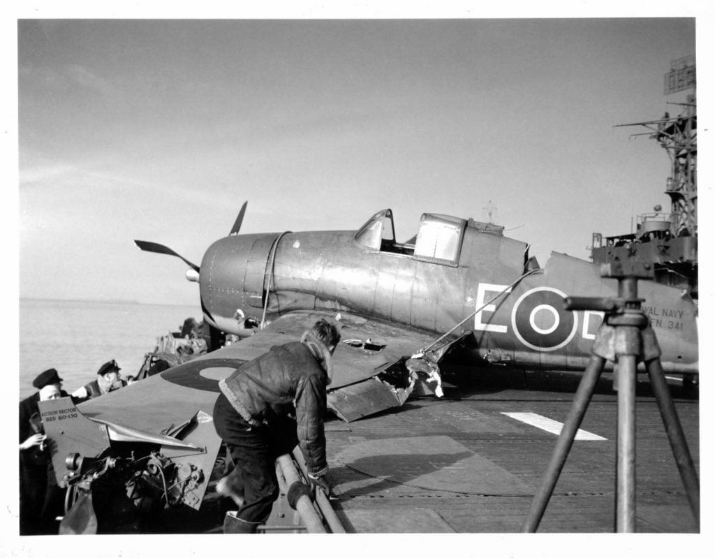 Recovering a crashed Grumman Hellcat, HMS Emperor