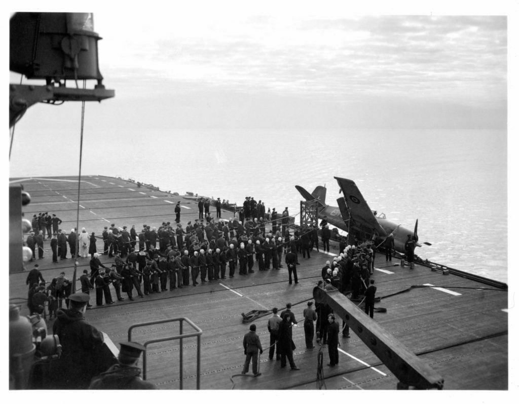 Recovering a crashed Grumman Hellcat, HMS Emperor