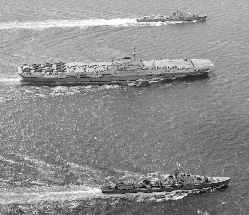 HMS Indefatigable escorted by the destroyers HMS Wizard and HMS Urchin, 1945