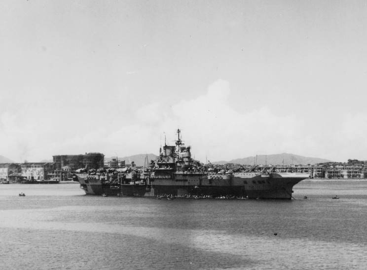 HMS Indomitable, possibly at Colombo, Ceylon in April 1946