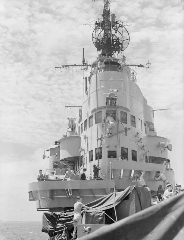 HMS Indomitable 1945. The war has just ended and the ship is being given a thorough painting and cleaning before returning home.