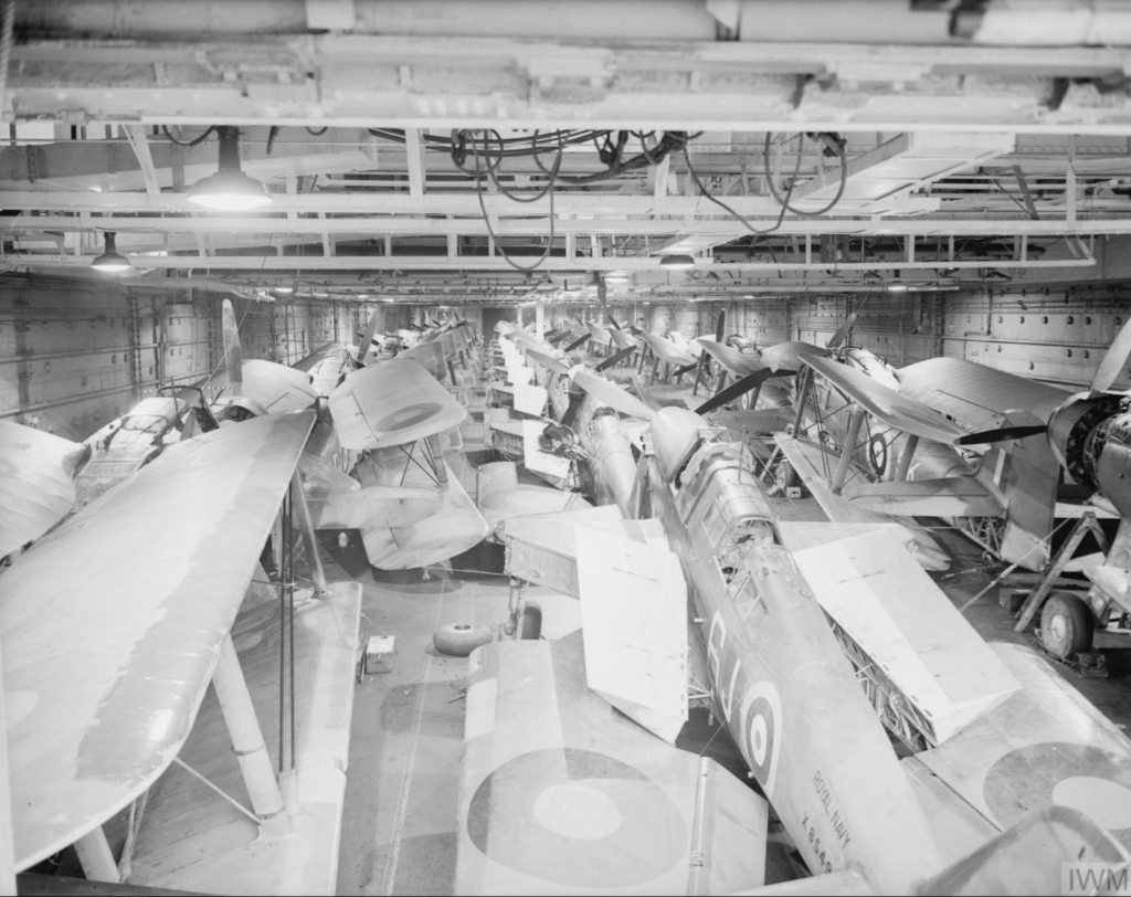 Fairey Albacores and Fulmars stowed in the hangar of HMS Victorious, Jan 1942