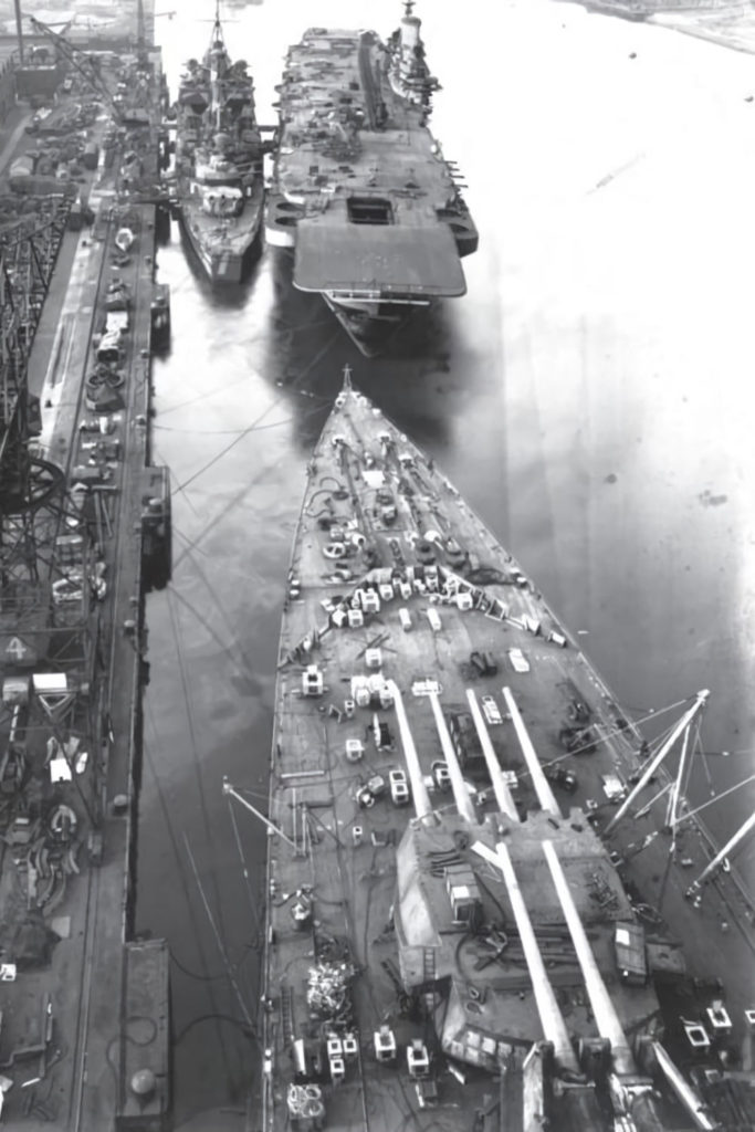 HMS King George V, HMS Illustrious, HMS Nigeria, under construction at Vickers-Armstrong, mid August 1940