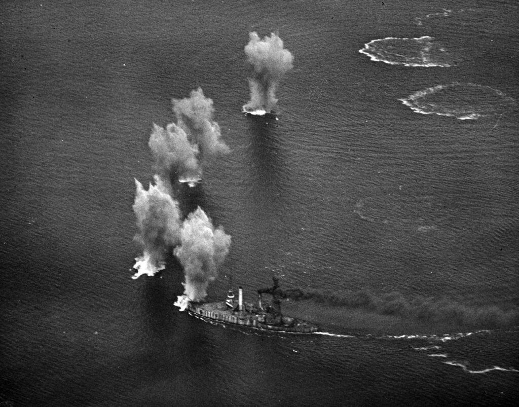 USS ex-Iowa (BB-4) under fire from Mississippi (BB-41) in the Gulf of Panama, 21 March 1923