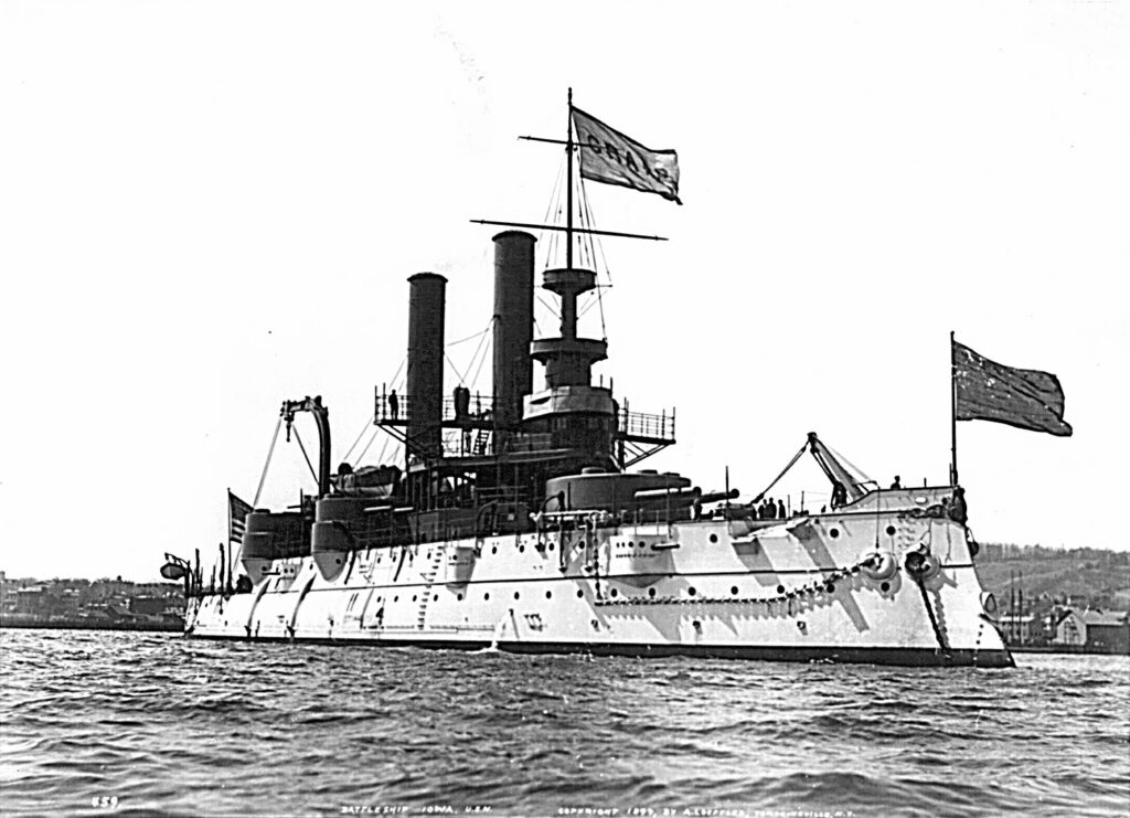 USS Iowa (BB-4) running trials in 1897. She is flying the flag of her builder, William Cramp & Sons, of Philadelphia, PA